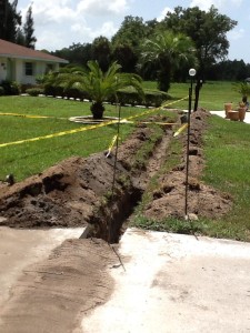 Digging trench for sewer pipe